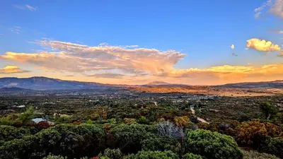 a view of a city with trees and mountains at Cahuilla Mountain Retreat in Anza
