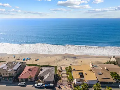 an aerial view of a beach with houses and the ocean at Carlsbad Coastal Retreat in Carlsbad