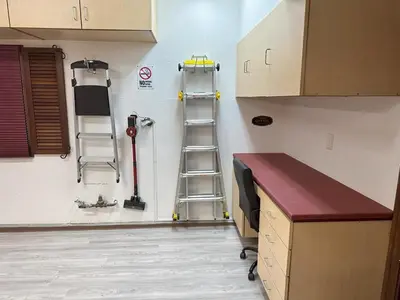 a room with a ladder next to a wall at Oceanside Tropical Resort with HEATED POOL & SPA! in Oceanside