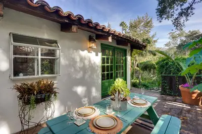 a patio with a table with plates on it at Romantic Retreat at Rancho Las Lomas Pet Friendly