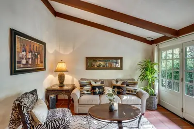 a living room with two couches and a table at Romantic Retreat at Rancho Las Lomas Pet Friendly