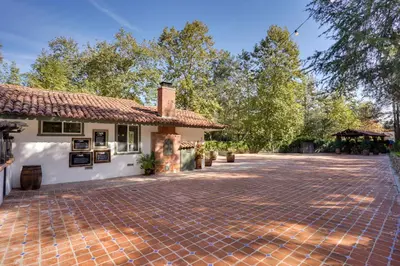 a brick driveway in front of a house at Spacious Courtyard and Spanish Charm Silverado Home