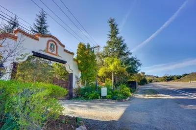 an empty street with a building on the side of a road at Spacious Courtyard and Spanish Charm Silverado Home