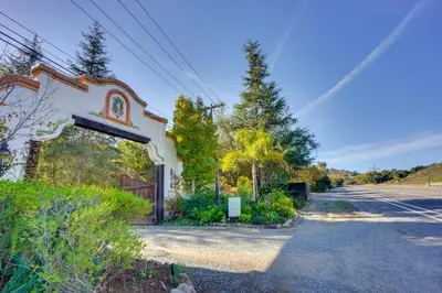an empty street with a building with a gate at Creative SoCal Escape! Trabuco Canyon Casita