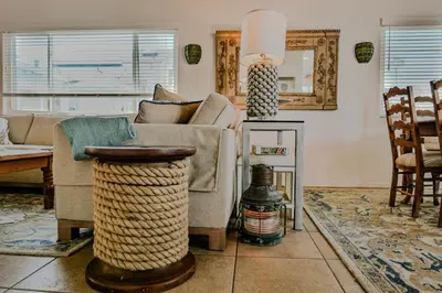 a living room with a couch and a table at 2 Bdr 2 bath luxury home steps away from Mission Beach 5 min from Belmont in San Diego