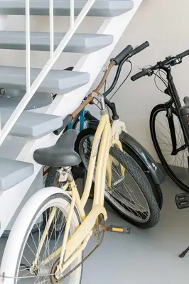 two bikes are parked next to some stairs at Marbella Lane - Bayfront Bliss Sunset Views w Pool in San Diego