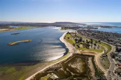 an aerial view of a beach and the ocean at Marbella Lane - Bayfront Bliss Sunset Views w Pool in San Diego