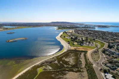 an aerial view of a beach and the ocean at Marbella Lane - Bayfront Bliss Sunset Views w Pool in San Diego