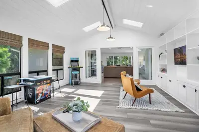 a living room with a couch and a tv at Fallbrook Pool & Spa Wine Country Estate in Fallbrook