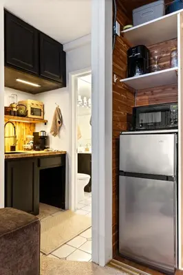 a kitchen with a stainless steel refrigerator and a counter at La Jolla Studio - Private Beach in San Diego
