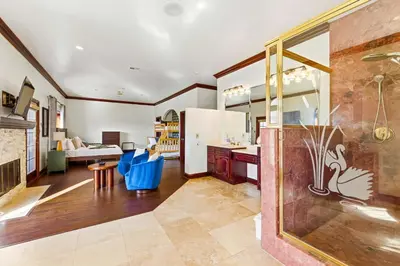 a kitchen and living room with a refrigerator at Indoor Pool & Spa - Gym - Sauna - Pickleball Court in Perris