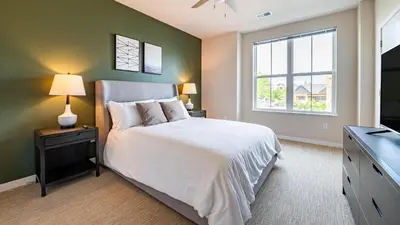 a bedroom with a white bed and a window at Landing Stylish 1BD Yoga Studio Game Room in Murrieta