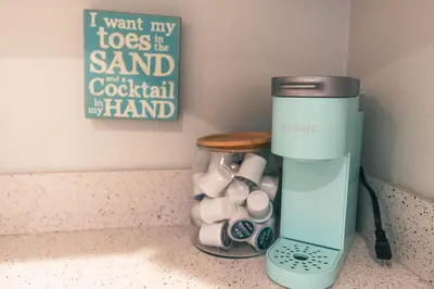 a blender sitting on a counter next to a jar of marshmallows at Mission Casa Del Sol in San Diego