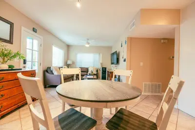 a dining room with a table and chairs at Mission Casa Del Sol in San Diego