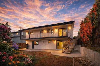 a house with a staircase leading up to it at Spacious & Newly Renovated Villa in San Diego - Perfect for Families in San Diego