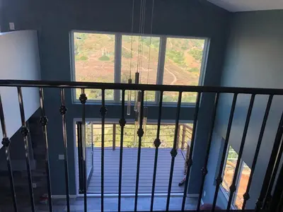 a staircase with a view of a window at LOVE SHACK on private canyon, minutes to the Beach in San Diego