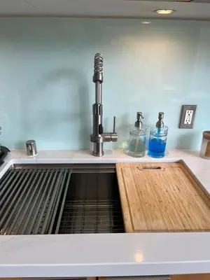 a kitchen sink with a metal faucet at Loft on 6th and Market in San Diego