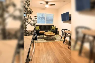 a kitchen and living room with a couch and a table at 1BR Close to Downtown SD, Beaches and North Park 1 in San Diego
