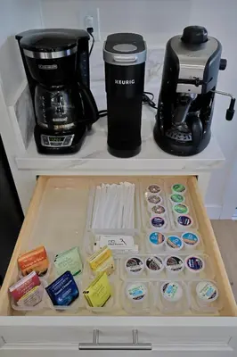 a refrigerator filled with food and a coffee maker at 2 Masters, Newly renovated with new furnishings - 4BR 3BA in San Diego