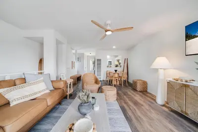 a living room with a couch and a table at Jewell Street Gem - 3 properties in 1 in San Diego