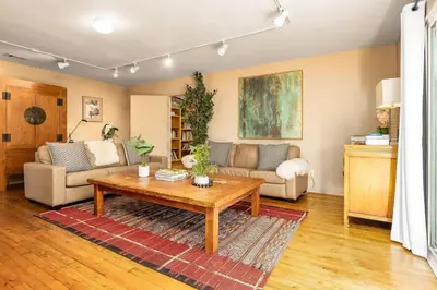 a living room with a couch and a coffee table at Carlsbad Zen - Large Pool in Carlsbad