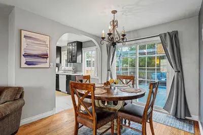 a kitchen and dining room with a table and chairs at Charming La Mesa Cottage - Patio - Quiet Neighborhood - Family in La Mesa