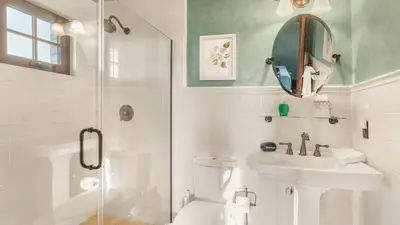 a bathroom with a shower and a toilet and a sink at Villa Di Gioia by AvantStay Private Wine-Country Estate Vineyard Views • Near Top Temecula Wineries in Temecula