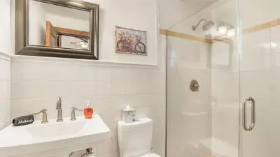 a bathroom with a shower and a toilet and a sink at Villa Di Gioia by AvantStay Private Wine-Country Estate Vineyard Views • Near Top Temecula Wineries in Temecula