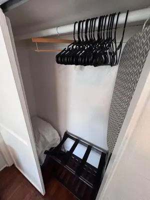 a room with a closet with a bunch of wine bottles at Cozy 1bed Home near Down Town SD in San Diego