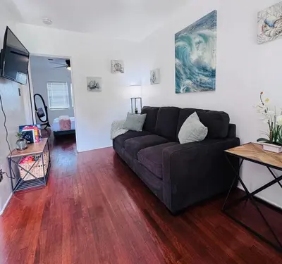 a living room with a couch and a table at Cozy 1bed Home near Down Town SD in San Diego