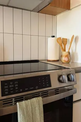 a stove top oven in a kitchen with a counter at Luxury Designer Hillcrest Apartment with Pool & Gym in San Diego