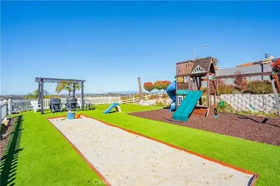 a park with a playground with a slide at Panoramic view in San Marcos