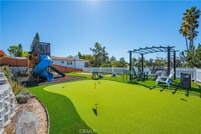 a park with a playground with a slide and swings at Panoramic view in San Marcos