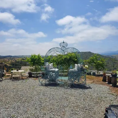 a bird cage sitting on top of a hill at Beverlys Hilltop Retreat in Fallbrook