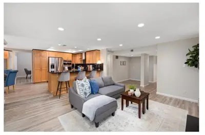 a living room with a couch and a table at Dream vacation home in Laguna Hills