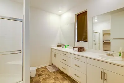 a bathroom with a sink and a mirror at Family Getaway with Pool, 8 Mi to Lake Elsinore! in Wildomar