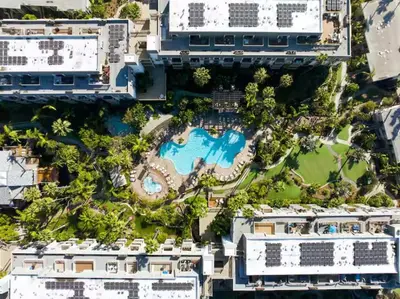 an aerial view of a resort with a swimming pool at Beachfront Resort-sunset views deck & luxe king in Oceanside