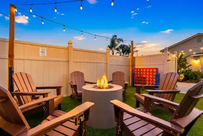 a patio with chairs and a fire pit at Stylish Retreat Near Mission Bay with Games & Firepit in San Diego
