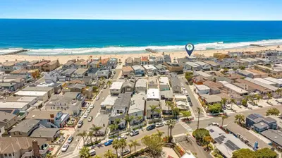 an aerial view of a city and the beach at 3Br Oceanfront Home W Patio Right On The Sand By Beachview Rentals in Newport Beach
