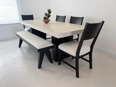 a wooden table and chairs with a potted plant on it at Luxury 3BR, 2BA Newly Renovated with Huge Backyard in San Diego