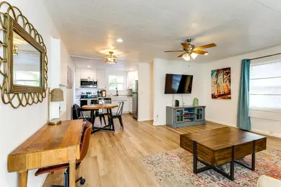 a living room with a table and a dining room at Private Hilltop Getaway with Patio Dogs Welcome! in Vista