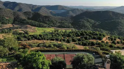an aerial view of a tennis court in the mountains at Sunset Point Estate in Poway