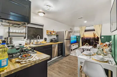 a kitchen with a sink and a counter top at Entire Private Home with 1 Bedroom, 1 Bathroom, King Bed, Hot Tub, Parking, View, Available Now in San Diego