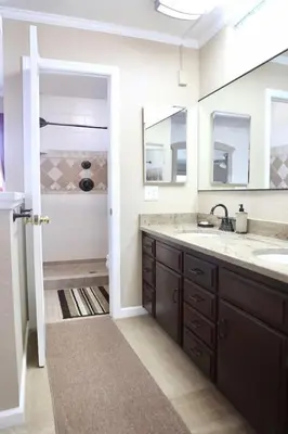 a bathroom with a sink and a shower at Quiet Hilltop Home With Stunning Hill Top And Valley Views in Valley Center