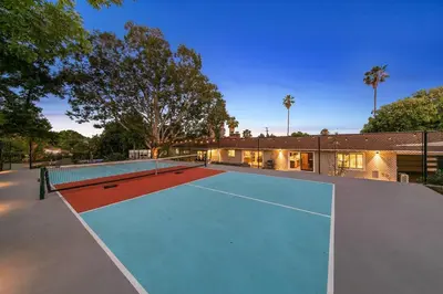 a tennis court in front of a house at Mt. Helix Resort+ Pool/Spa, Pickleball, Amenities! in La Mesa