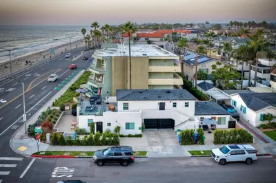 an aerial view of a house and the ocean at Modern Ocean-View Retreat w/ Firepit & Steps to Carlsbad Beach in Carlsbad