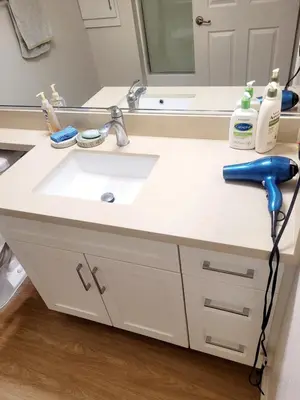 a bathroom counter with a sink and a mirror at Irvine Spectrum 1 bed 1 bath in Irvine