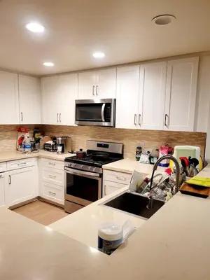 a kitchen with a sink and a microwave at Irvine Spectrum 1 bed 1 bath in Irvine