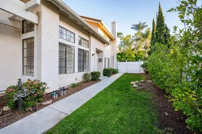 a house with a walkway in front of a yard at Luxe 2-Story Oasis with Private Pool & Backyard in Laguna Niguel