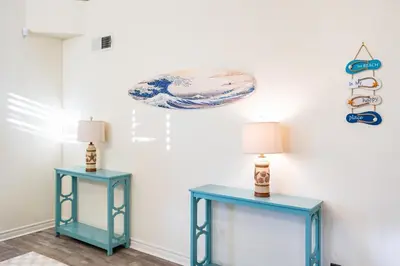 two blue tables in a room with two lamps at Luxe 2-Story Oasis with Private Pool & Backyard in Laguna Niguel